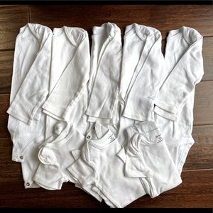 Set of 8 Carter’s onesies 12 months